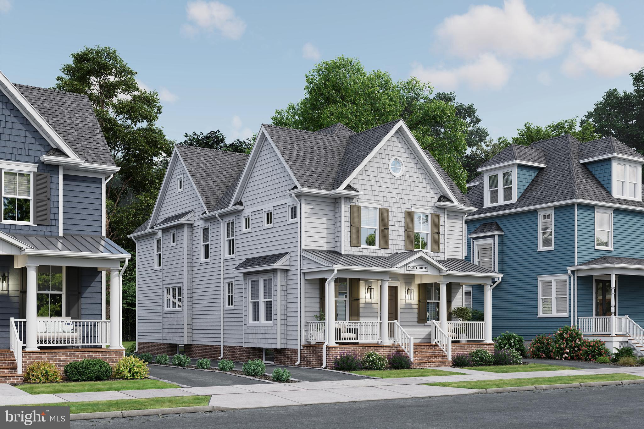 33 Estaugh Avenue Haddonfield, NJ 08033 - Photo 3 of 5 a front view of a house with a garden