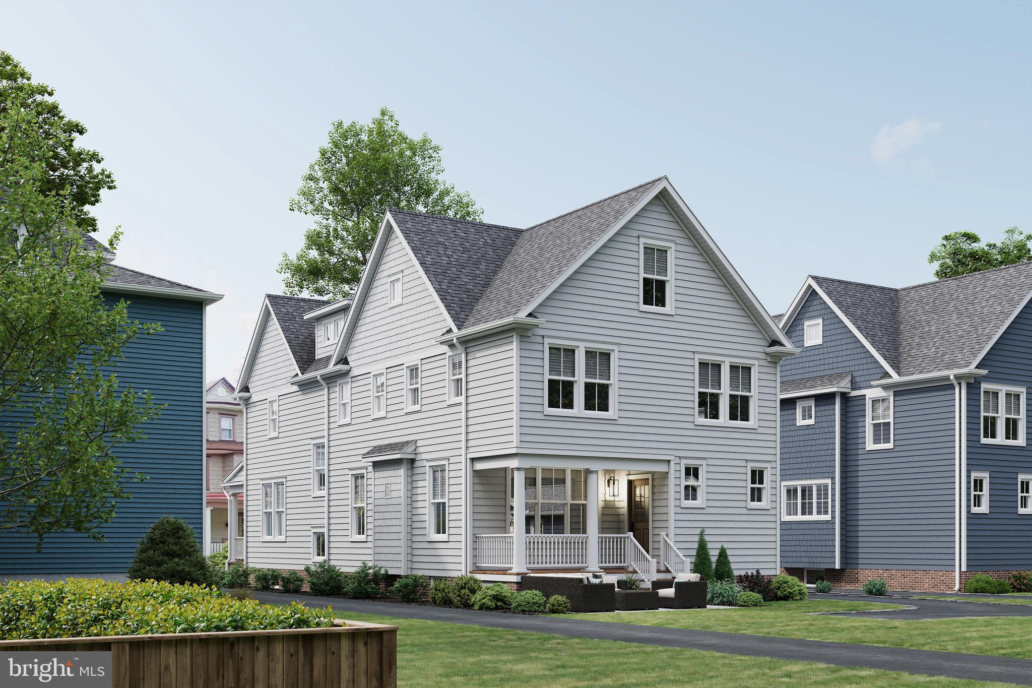 33 Estaugh Avenue Haddonfield, NJ 08033 - Photo 4 of 5 a front view of a house with a yard