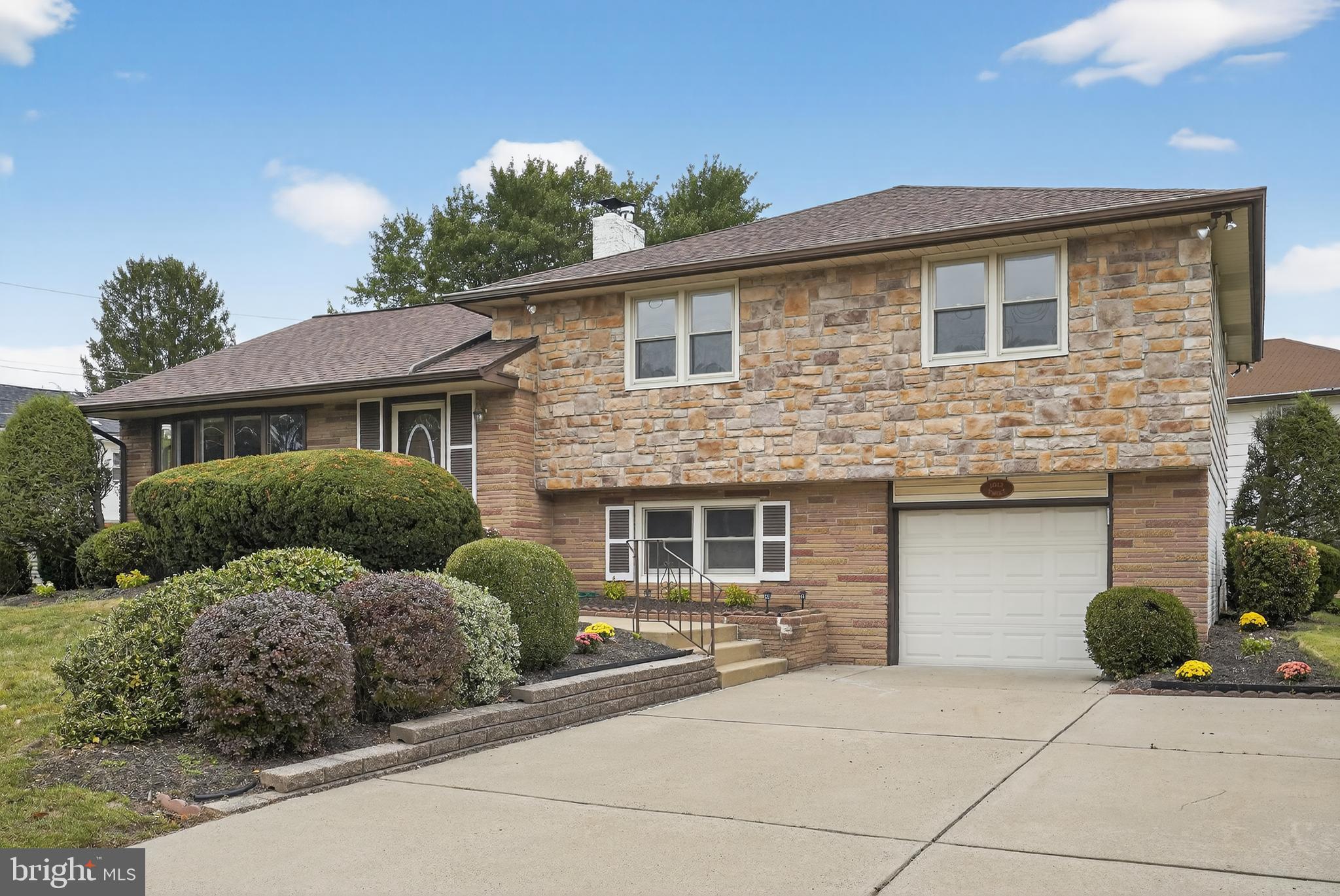 1012 Twist Road Philadelphia, PA 19115 - Photo 1 of 30 a front view of a house with garden