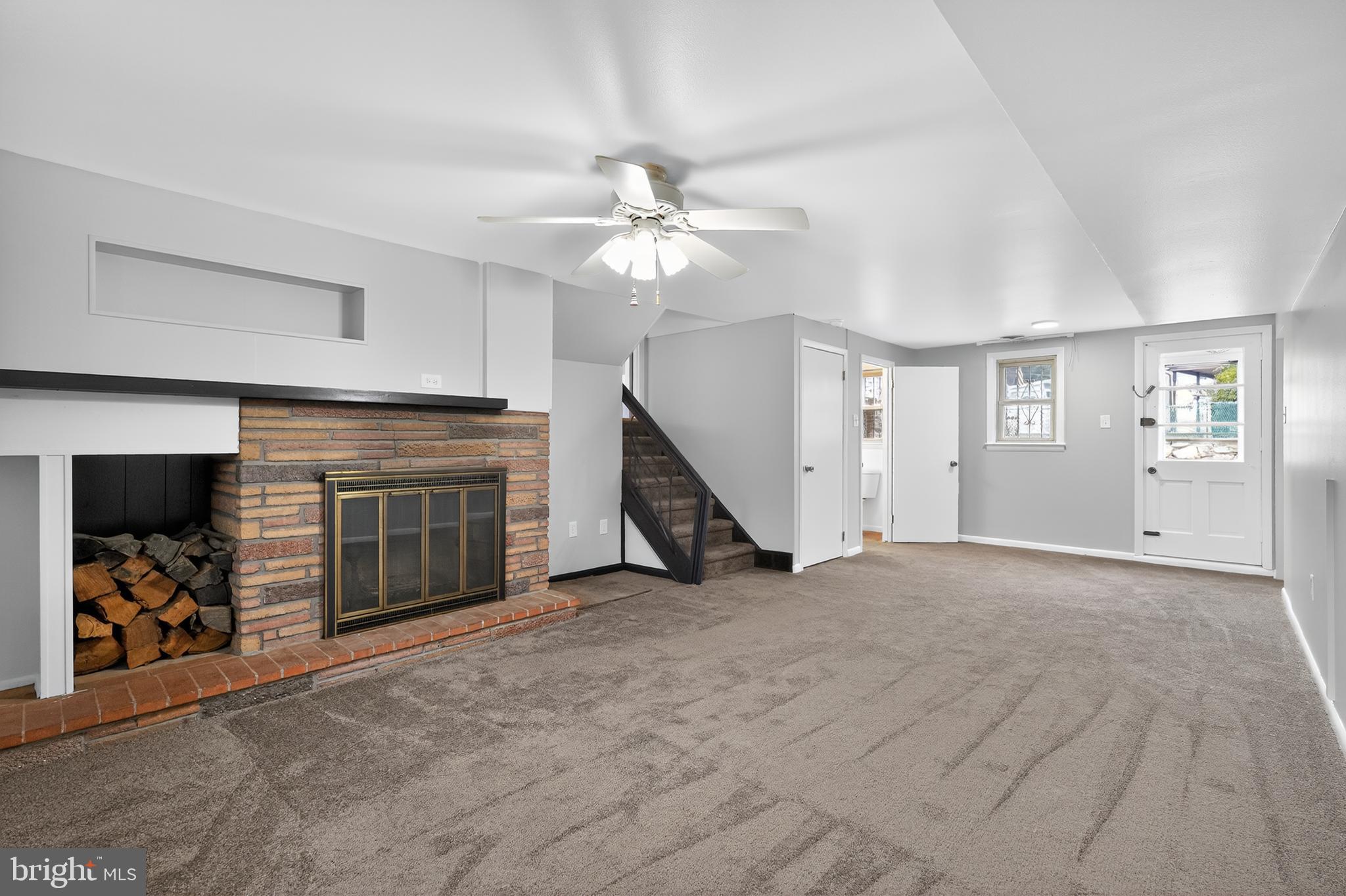 1012 Twist Road Philadelphia, PA 19115 - Photo 11 of 30 a view of a livingroom with an empty space and a ceiling fan