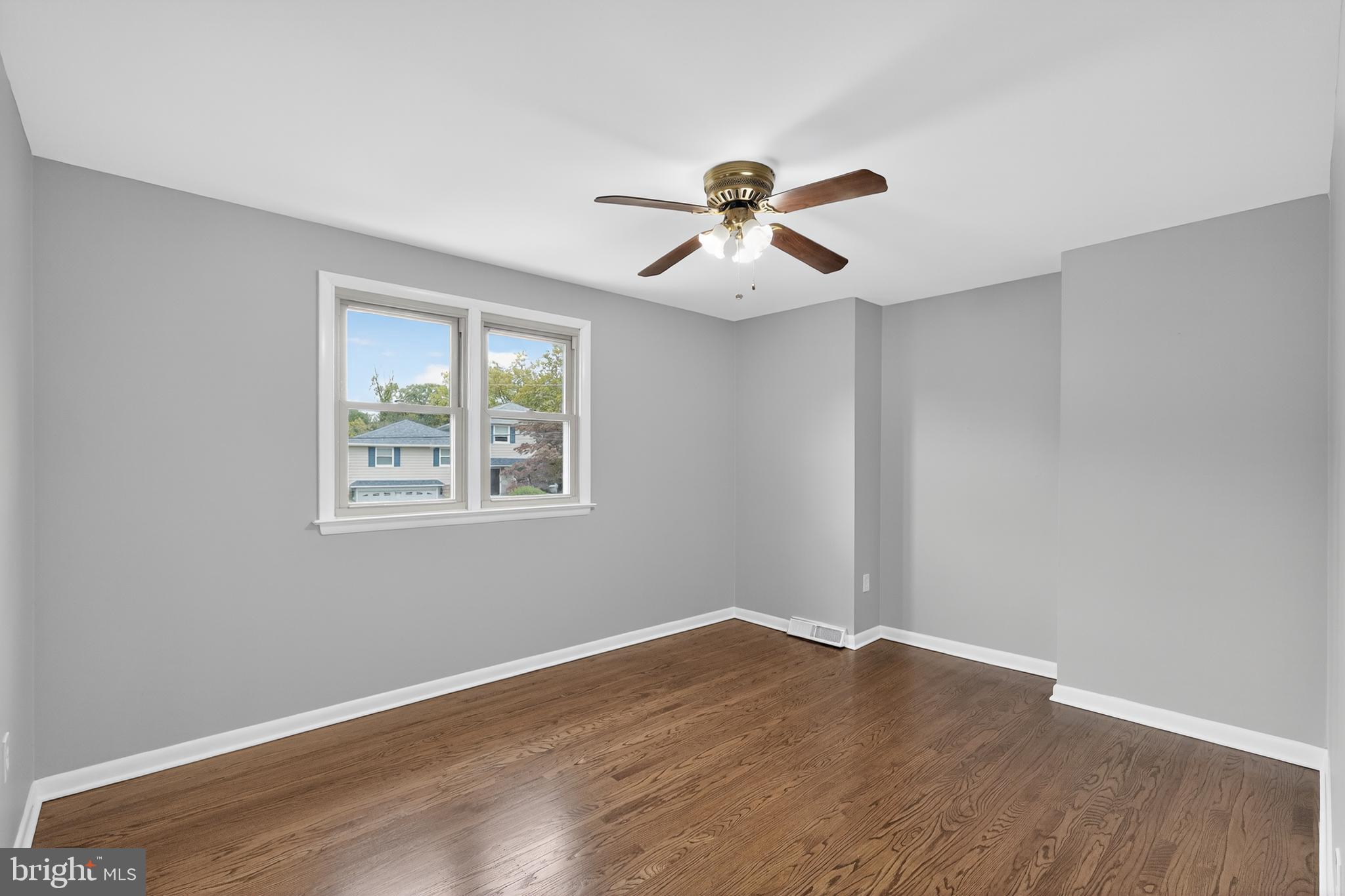 1012 Twist Road Philadelphia, PA 19115 - Photo 16 of 30 a view of a big room with wooden floor and windows
