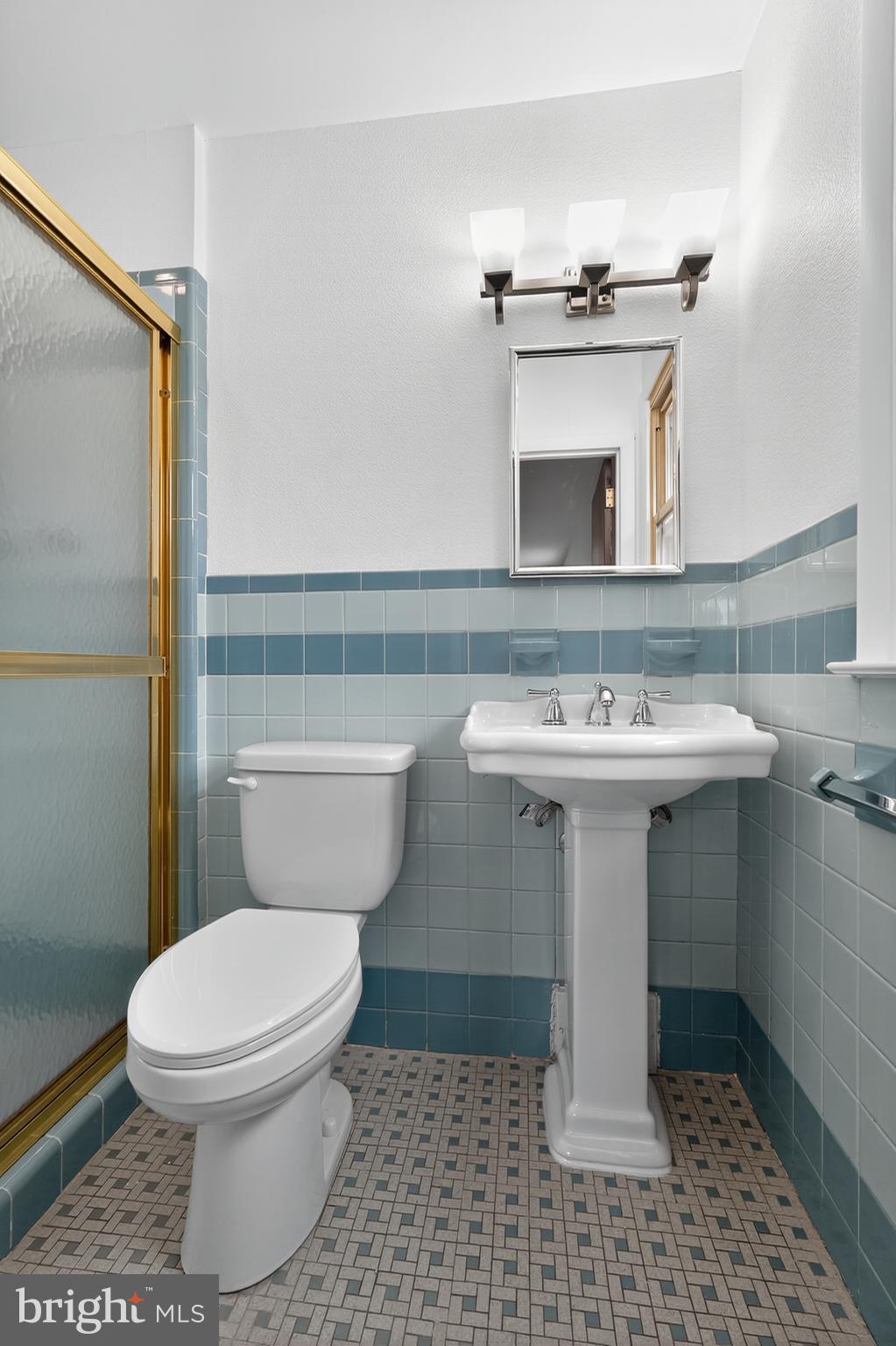 1012 Twist Road Philadelphia, PA 19115 - Photo 17 of 30 a bathroom with a sink toilet and mirror