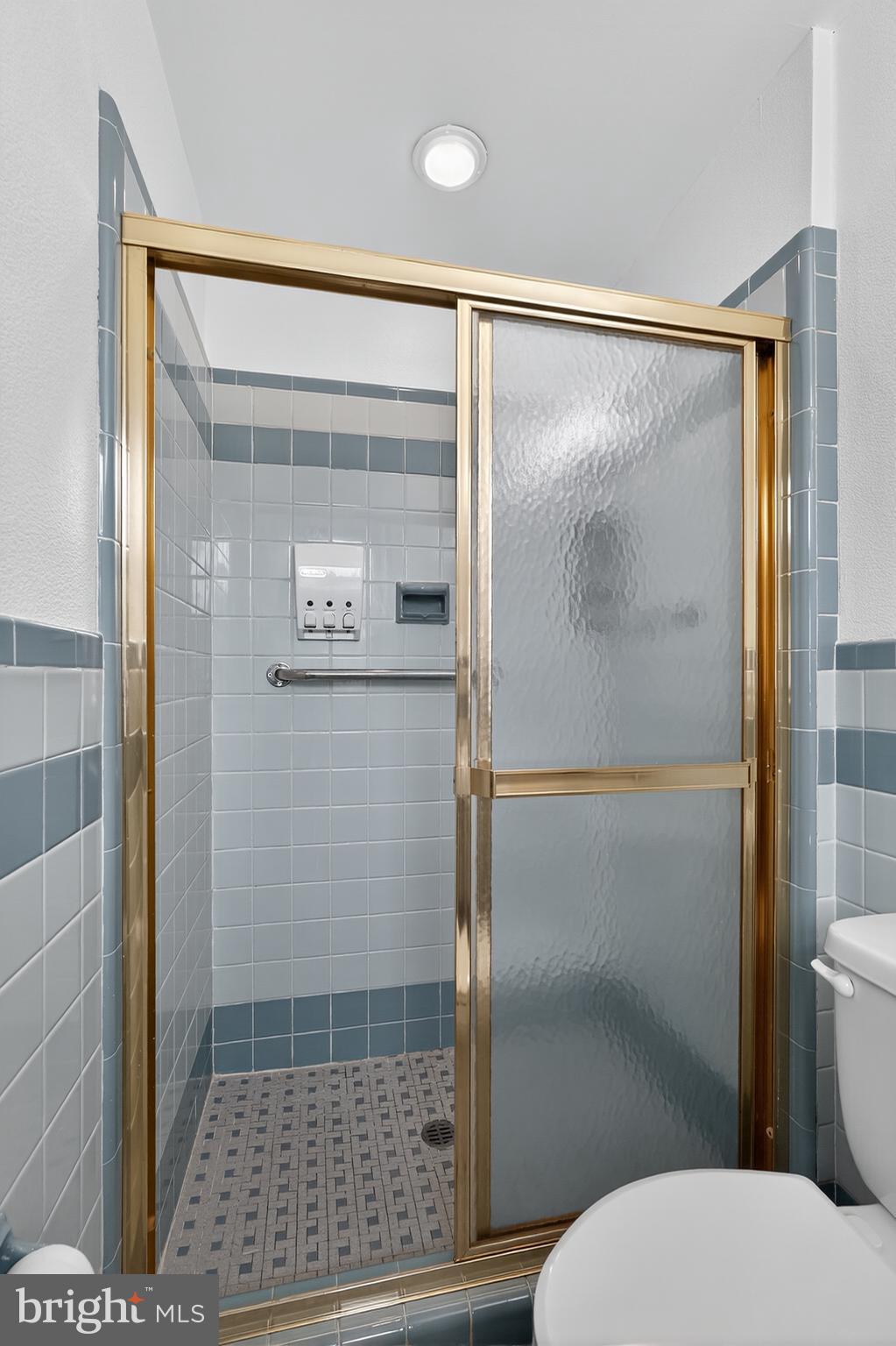 1012 Twist Road Philadelphia, PA 19115 - Photo 18 of 30 a bathroom with a glass shower door