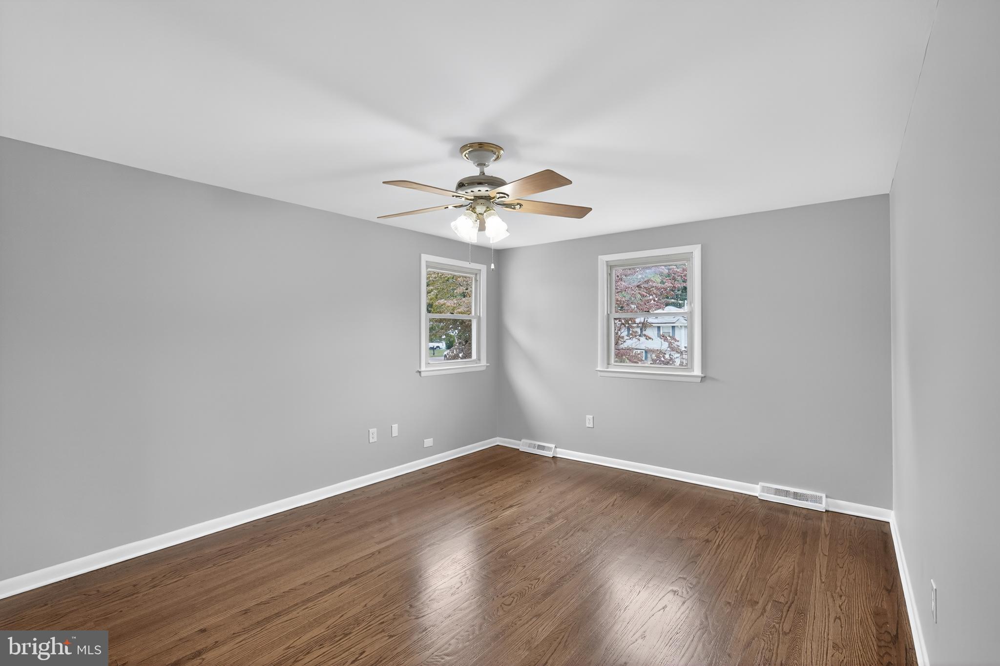 1012 Twist Road Philadelphia, PA 19115 - Photo 19 of 30 a view of a room with wooden floor and ceiling fan