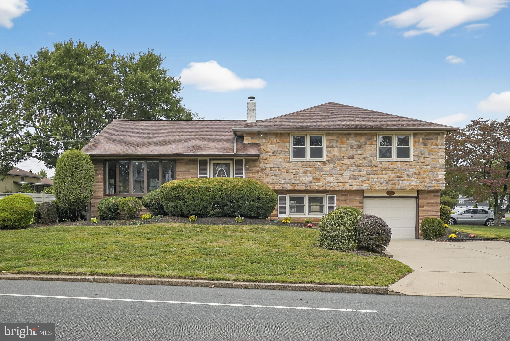 1012 Twist Road Philadelphia, PA 19115 - Photo 2 of 30 a front view of a house with a yard