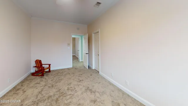 a view of a room with a bench