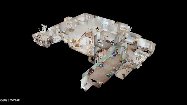 a white vase with flowers sitting on a table