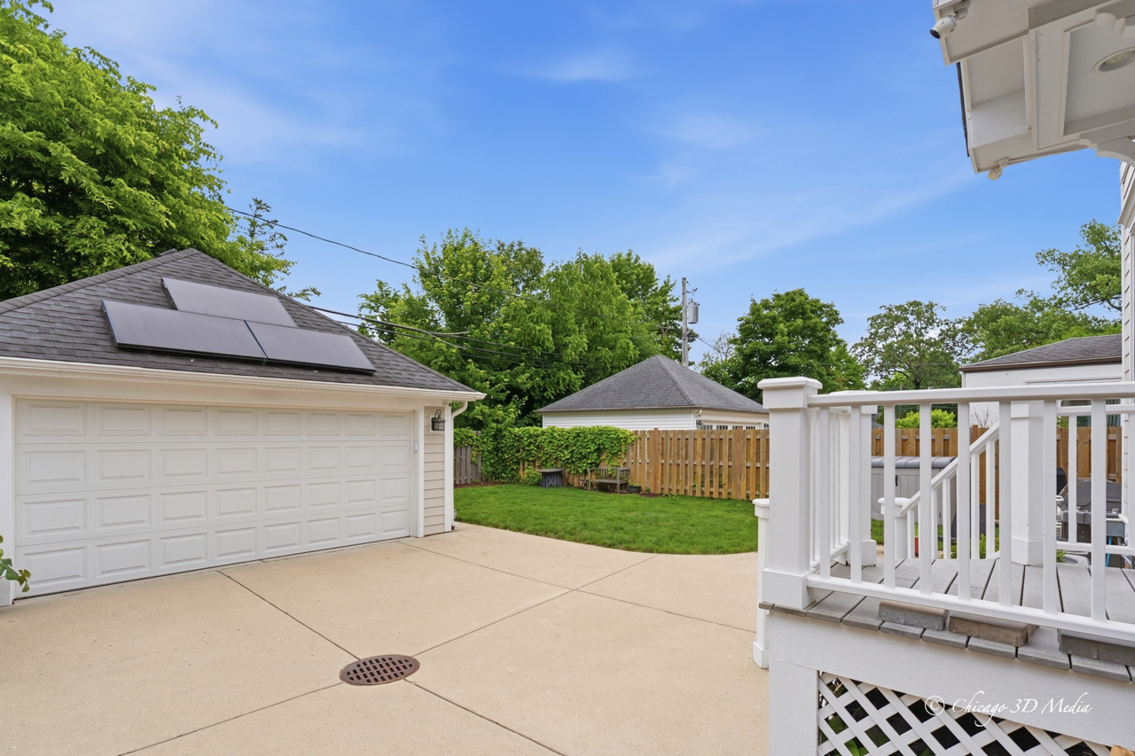 306 17th Street Wilmette, IL 60091 - Photo 41 of 48 a view of backyard of house with wooden deck and seating space