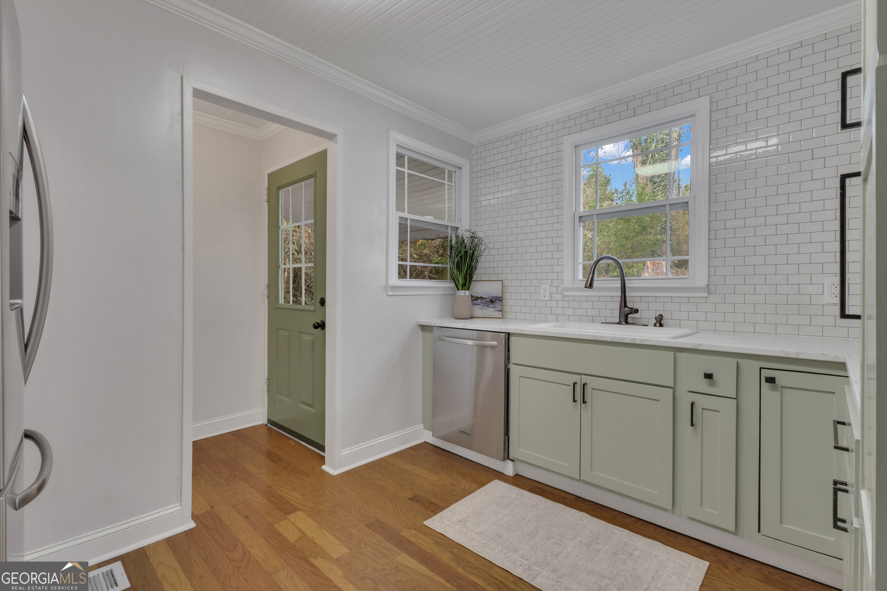 9 Meridian Drive Newnan, GA 30263 - Photo 13 of 42 a spacious bathroom with a double vanity sink a mirror and a