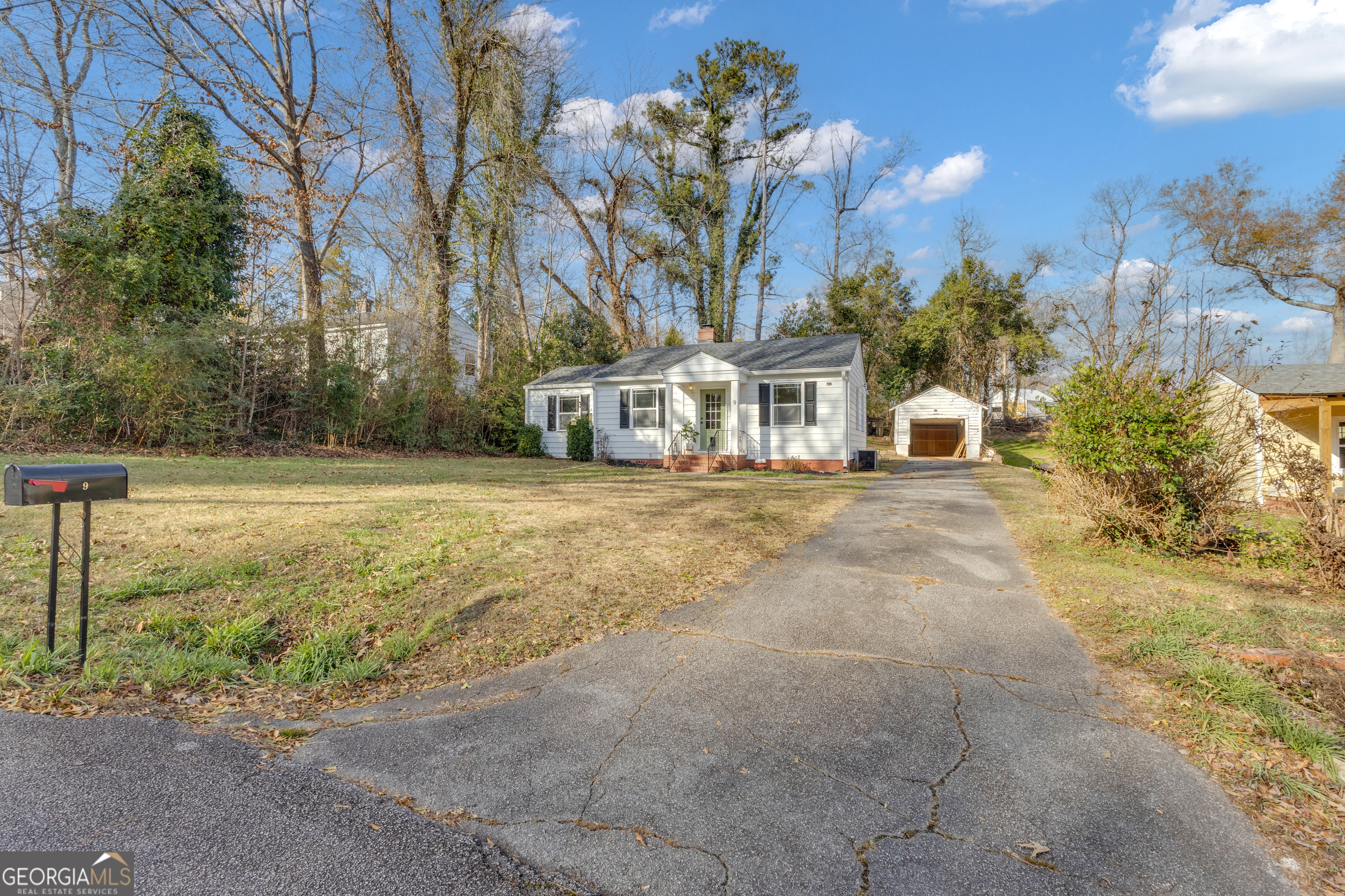 9 Meridian Drive Newnan, GA 30263 - Photo 3 of 42 a view of a house with backyard and trees