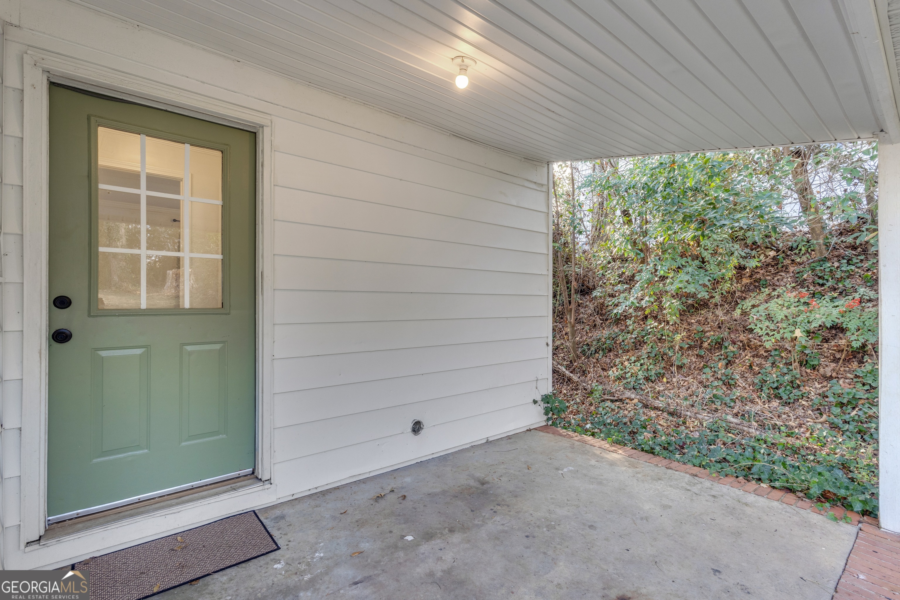 9 Meridian Drive Newnan, GA 30263 - Photo 34 of 42 an empty room with wooden floor and windows