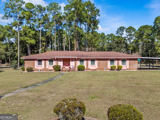 front view of a house with a big yard