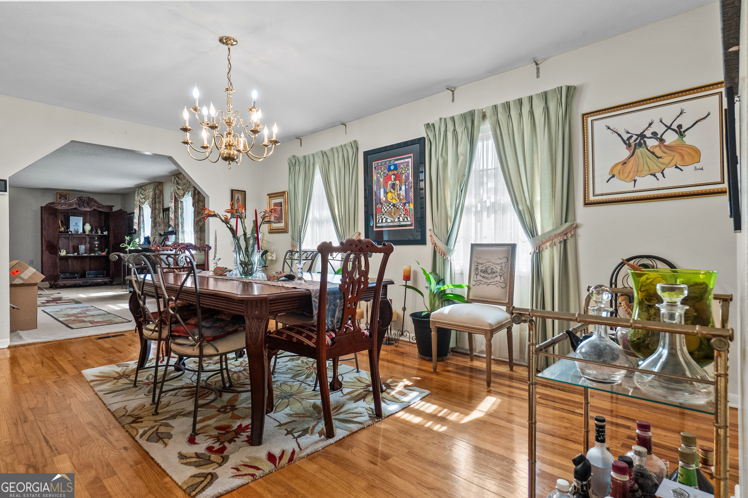 2101 Goldendale Lane Albany, GA 31721 - Photo 15 of 59 a view of a dining room with furniture window and wooden floor