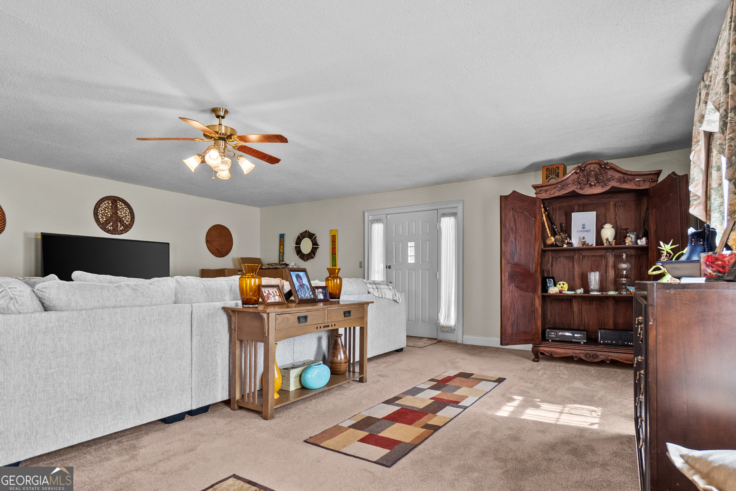 2101 Goldendale Lane Albany, GA 31721 - Photo 21 of 59 a living room with furniture and a chandelier
