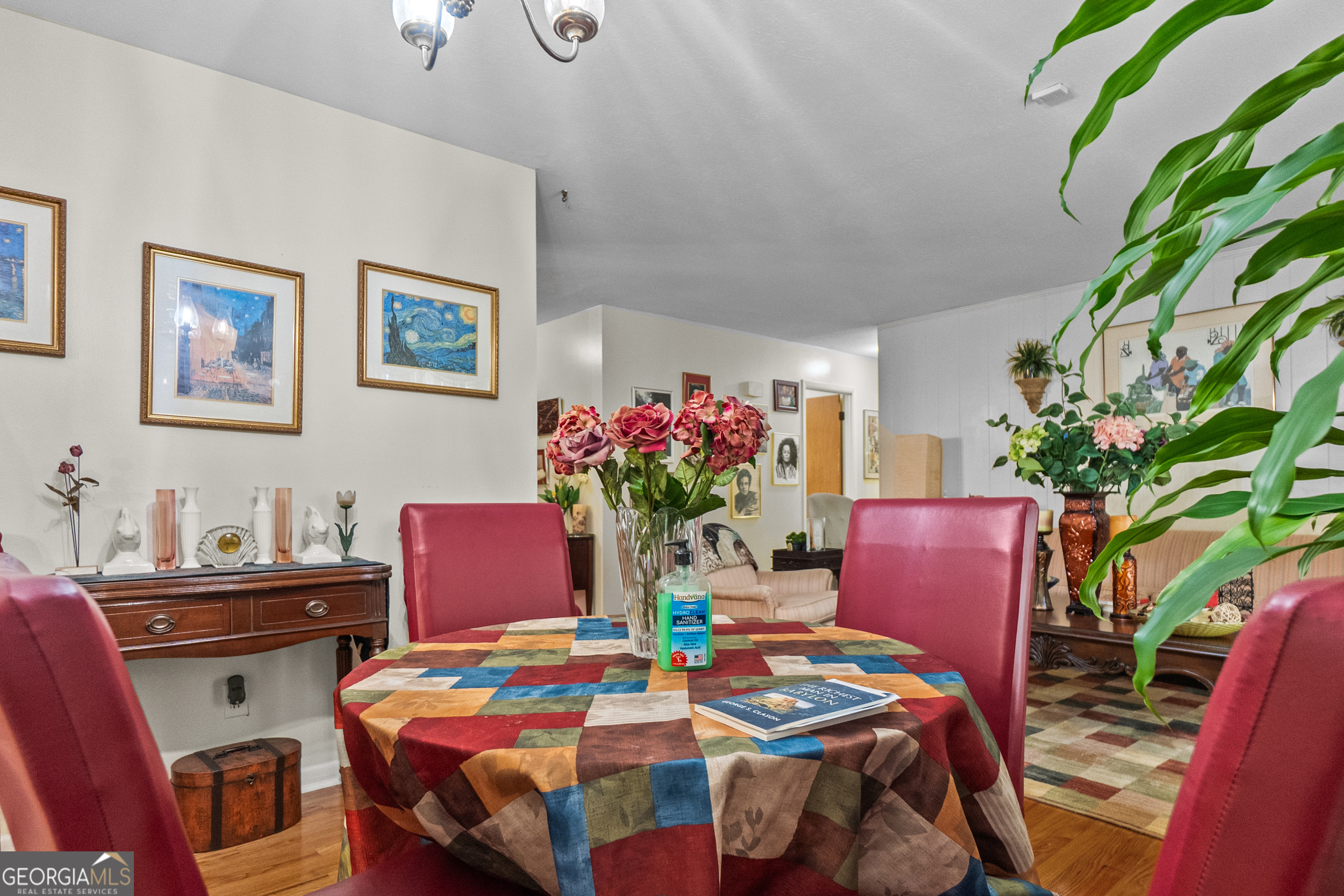 2101 Goldendale Lane Albany, GA 31721 - Photo 26 of 59 a dining room with furniture and flowers