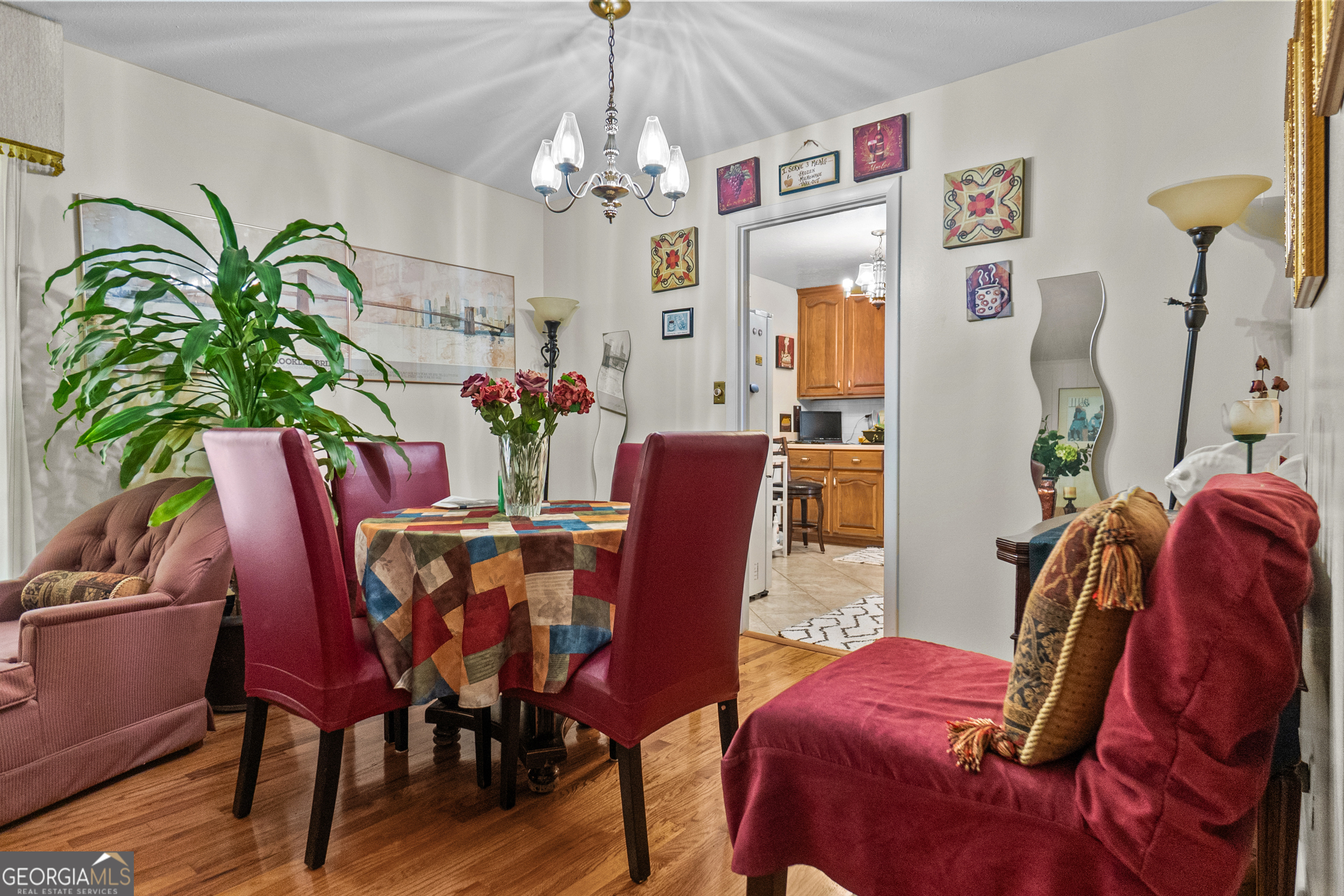 2101 Goldendale Lane Albany, GA 31721 - Photo 28 of 59 a view of a dining room with furniture and chandelier