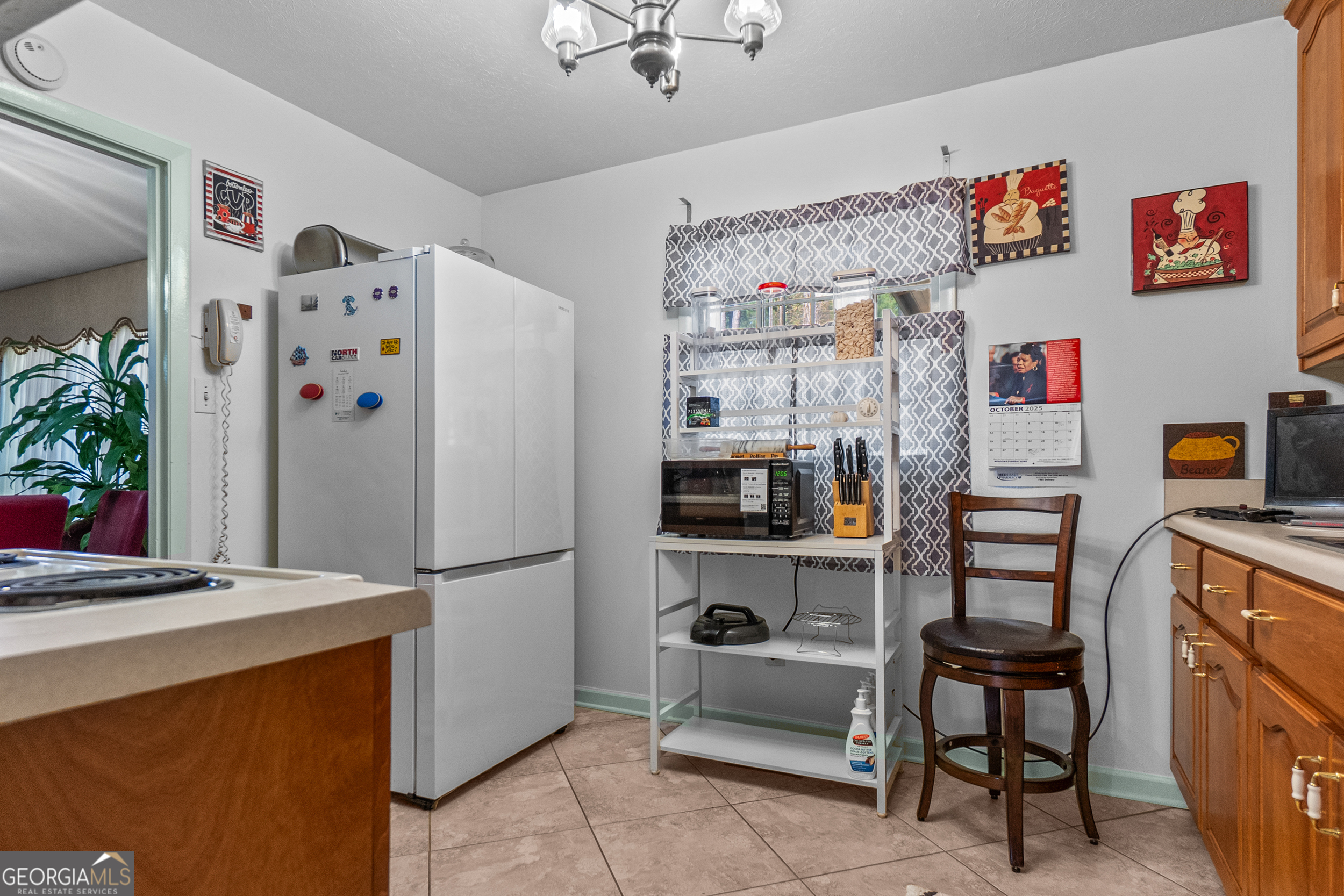 2101 Goldendale Lane Albany, GA 31721 - Photo 30 of 59 a white refrigerator freezer sitting in a kitchen and a refrigerator
