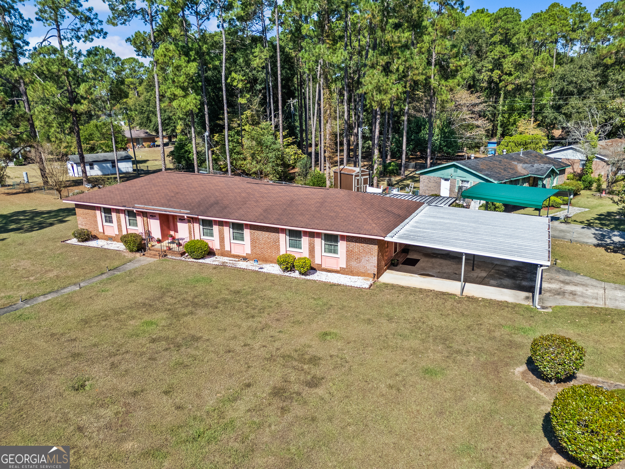 2101 Goldendale Lane Albany, GA 31721 - Photo 3 of 59 an aerial view of a house with swimming pool and large trees