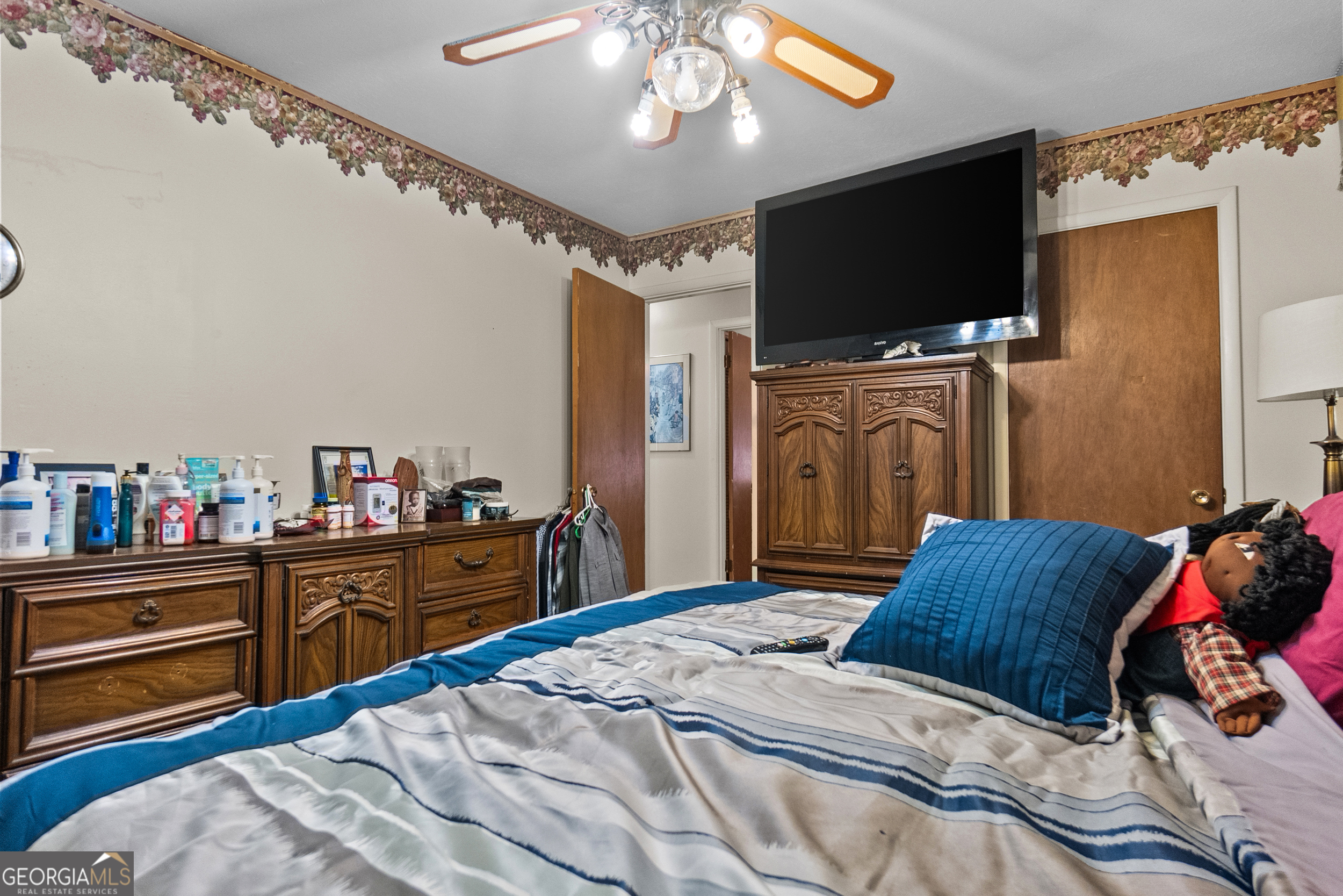 2101 Goldendale Lane Albany, GA 31721 - Photo 34 of 59 a bedroom with a bed and a flat screen tv