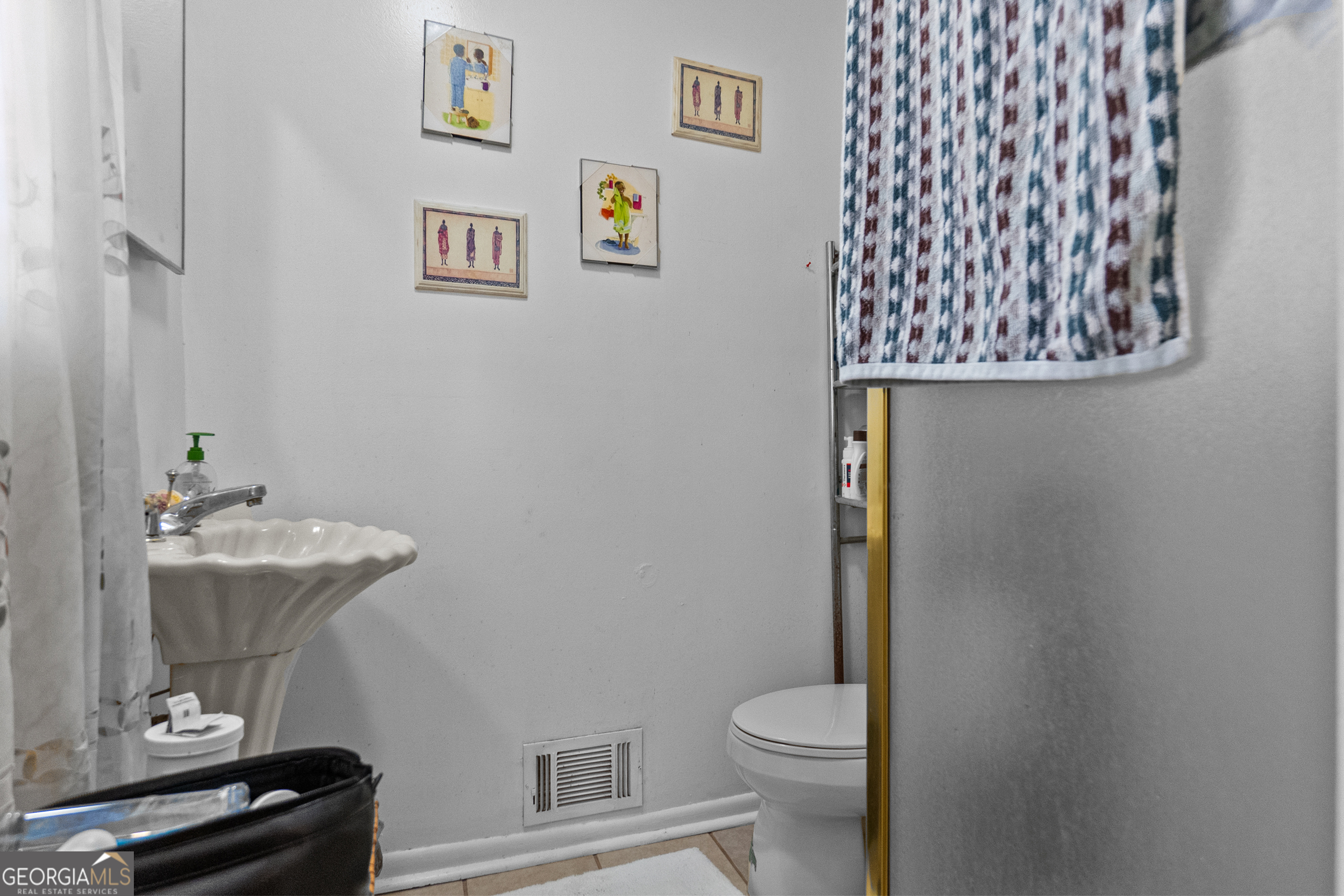 2101 Goldendale Lane Albany, GA 31721 - Photo 36 of 59 a bathroom with a sink and toilet