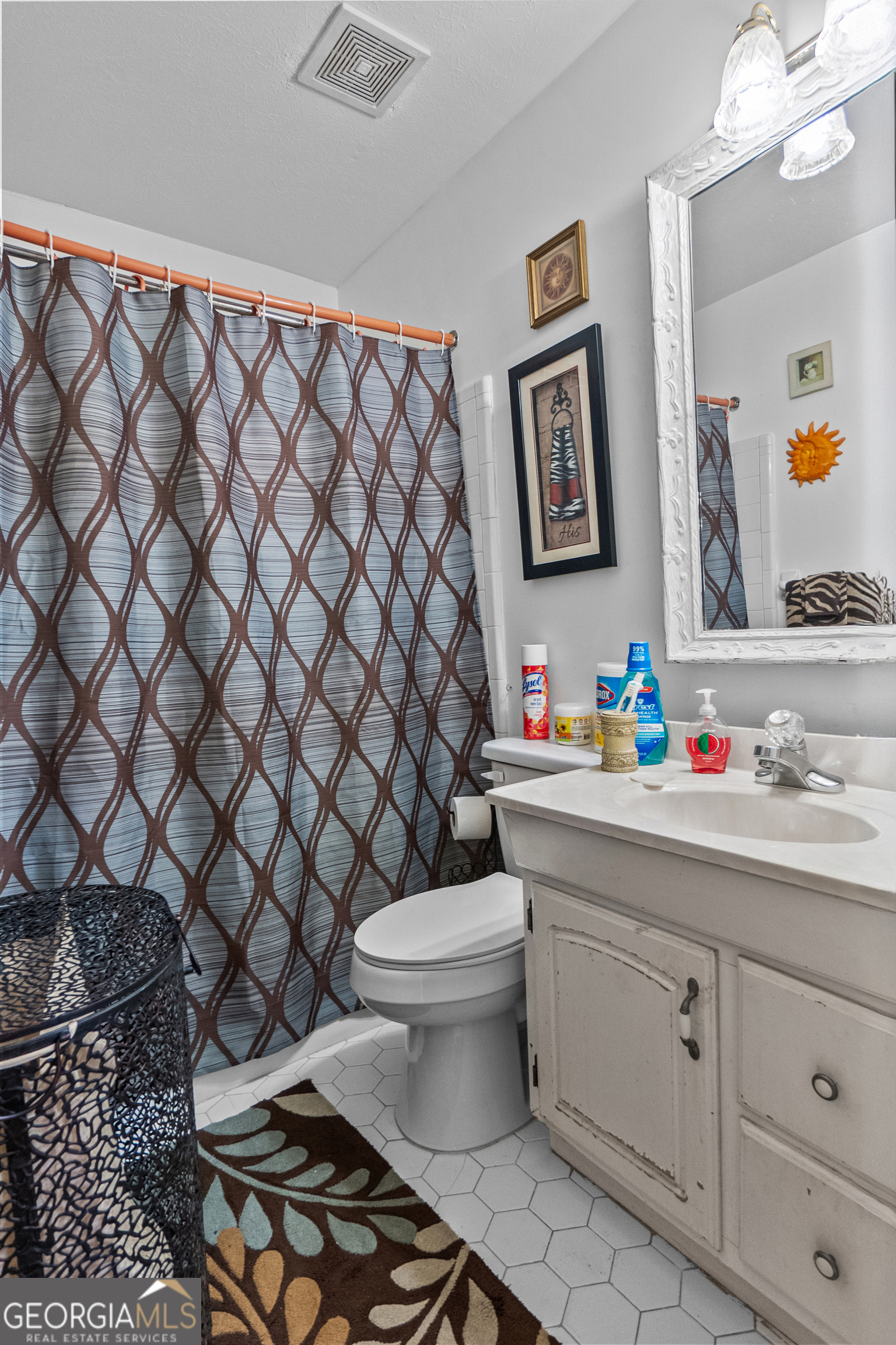 2101 Goldendale Lane Albany, GA 31721 - Photo 40 of 59 a bathroom with a granite countertop toilet and a sink