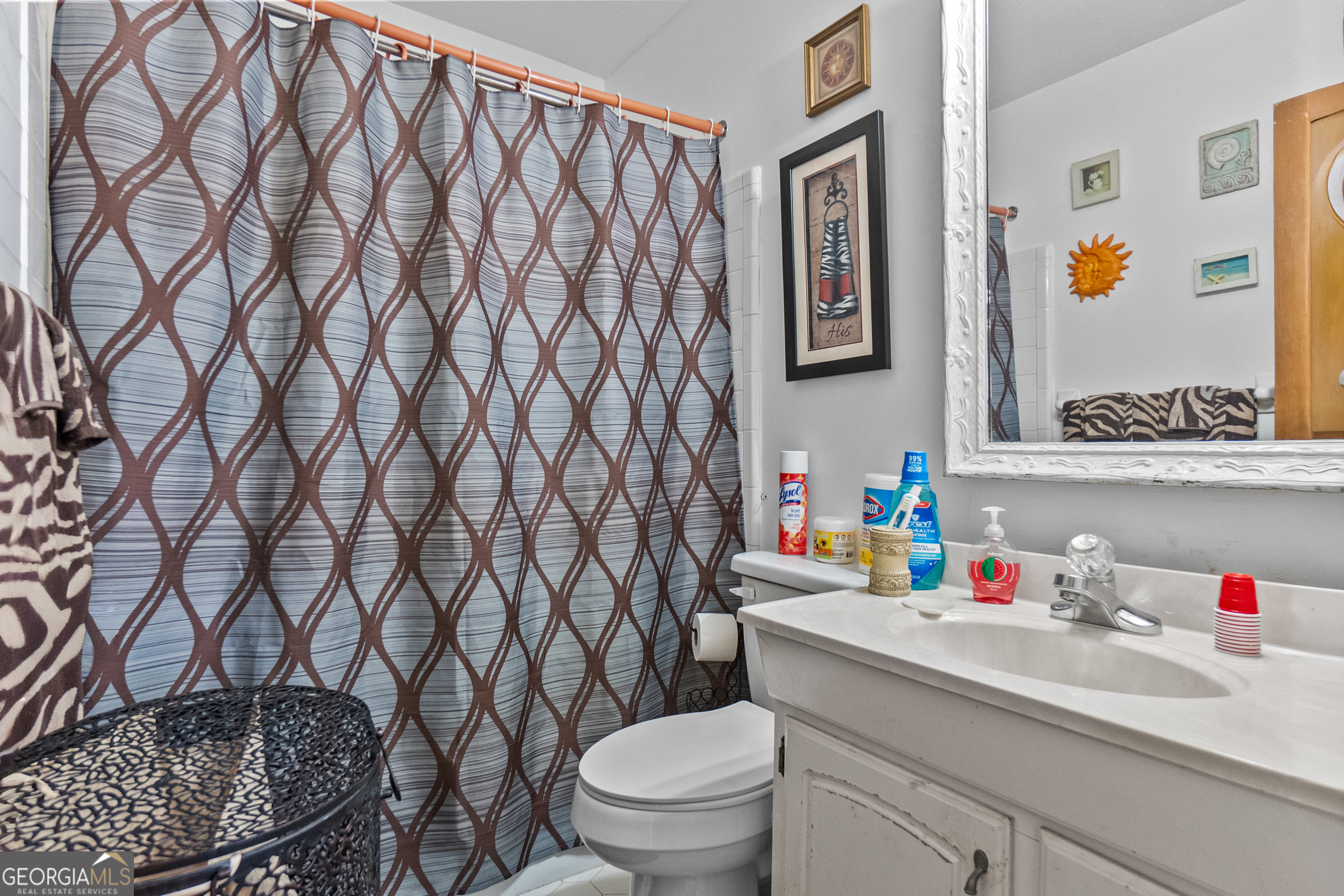 2101 Goldendale Lane Albany, GA 31721 - Photo 41 of 59 a bathroom with a granite countertop sink and a toilet