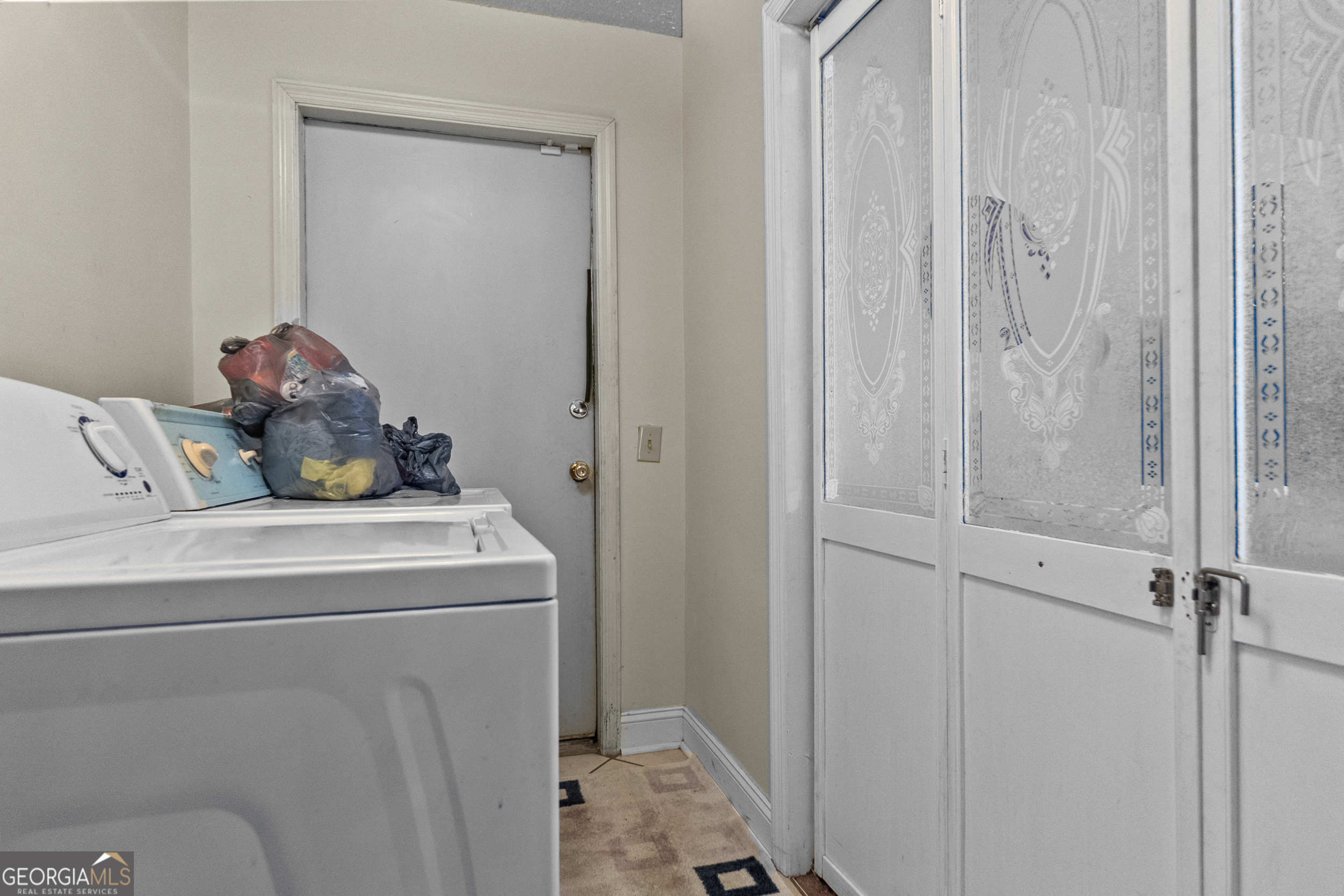 2101 Goldendale Lane Albany, GA 31721 - Photo 47 of 59 a utility room with dryer and washer
