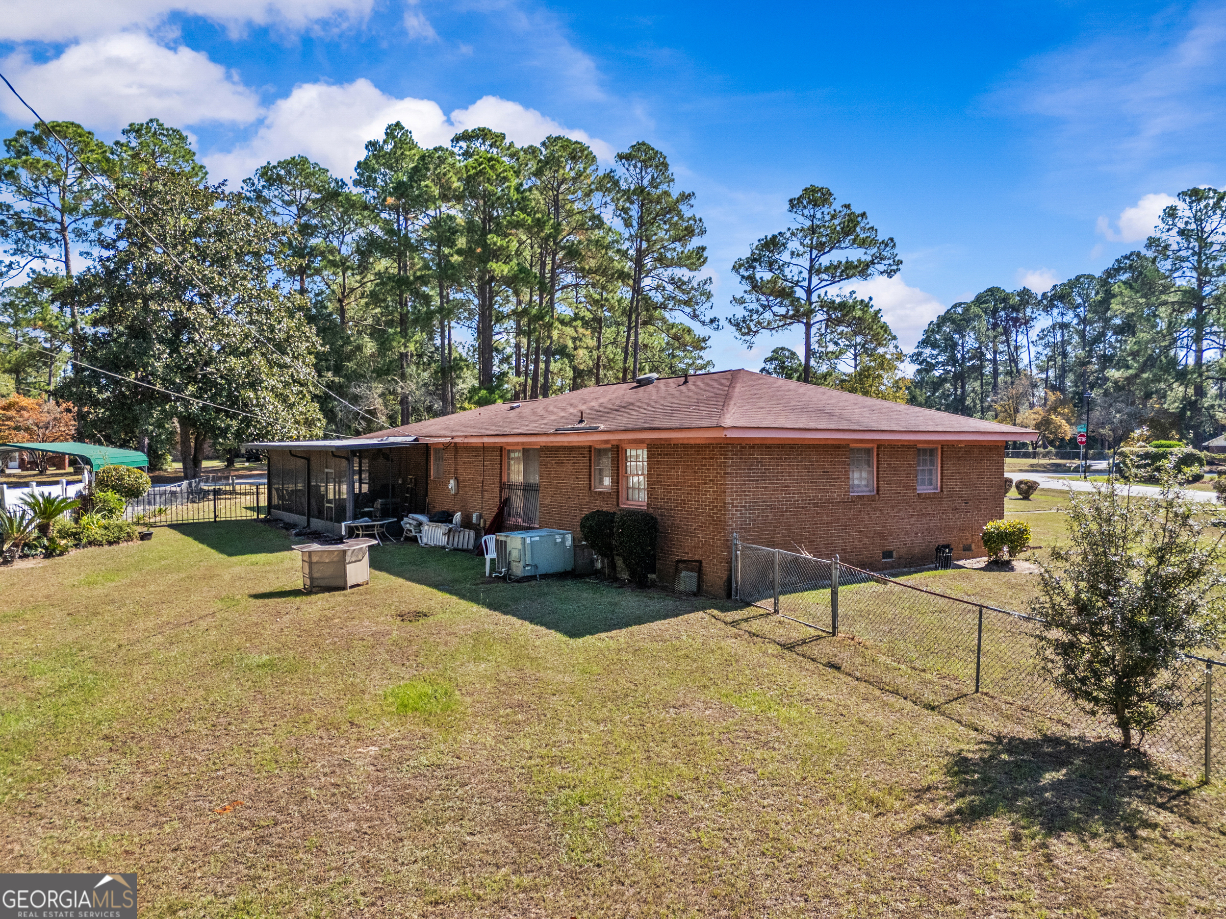 2101 Goldendale Lane Albany, GA 31721 - Photo 52 of 59 a swimming pool with outdoor seating and yard