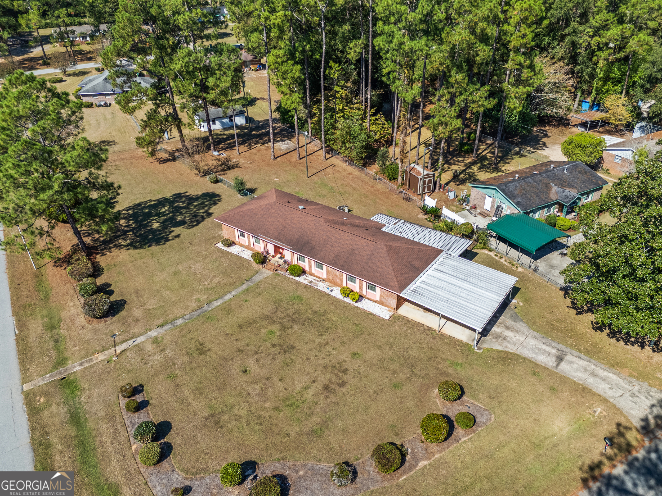 2101 Goldendale Lane Albany, GA 31721 - Photo 7 of 59 a view of a backyard of a house