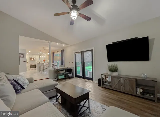 a front view of house with an outdoor space and seating