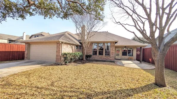 a front view of a house with a patio