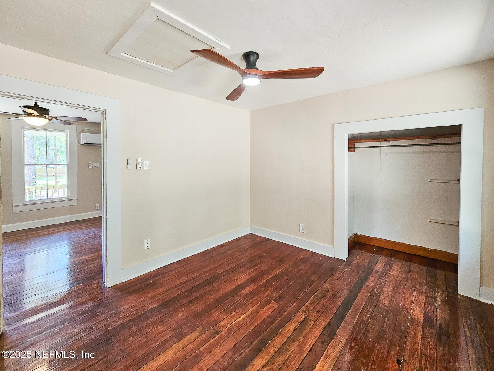 125 Lemon Street, Unit 22 Melrose, FL 32666 - Photo 18 of 28 a view of empty room with wooden floor