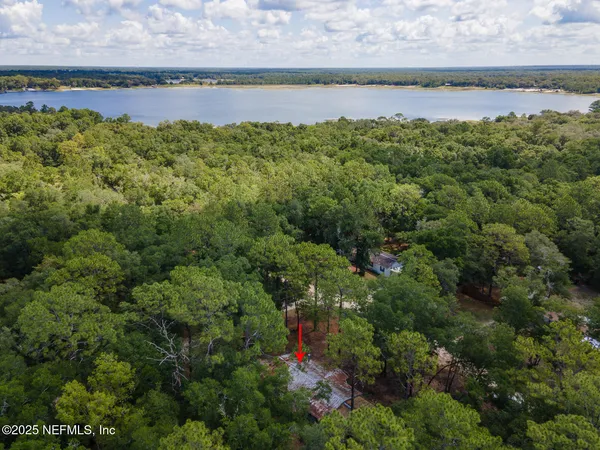 a view of a lake with a house