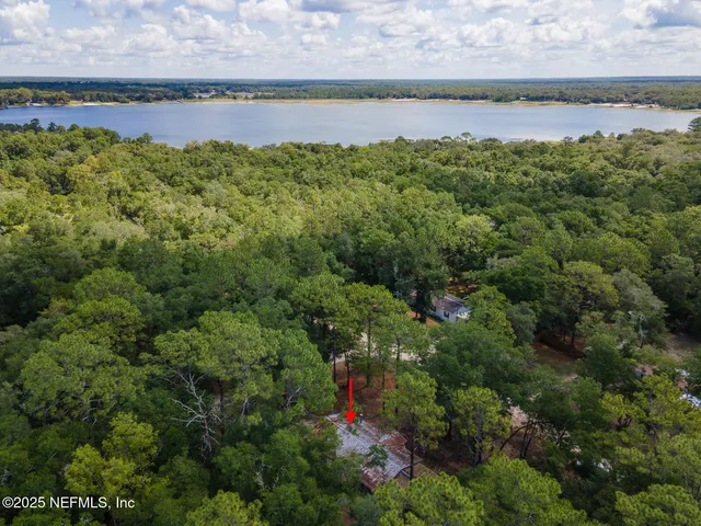 a view of a lake with a house
