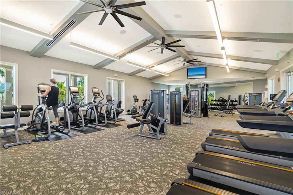 20111 Torch Key Way Estero, FL 33928 - Photo 26 of 29 a view of a room with gym equipment