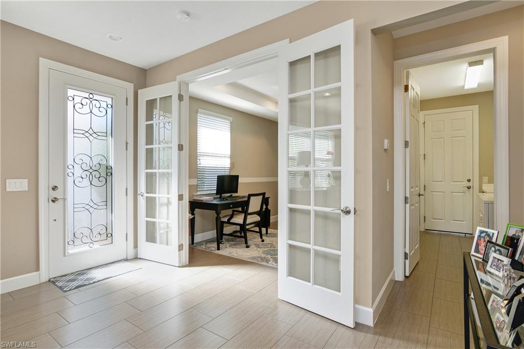 20111 Torch Key Way Estero, FL 33928 - Photo 10 of 29 a view of a livingroom with furniture and a window