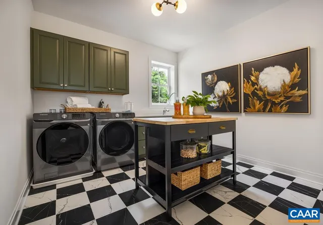 a living room with a black white checkered floor with a gaming machine and dining chairs