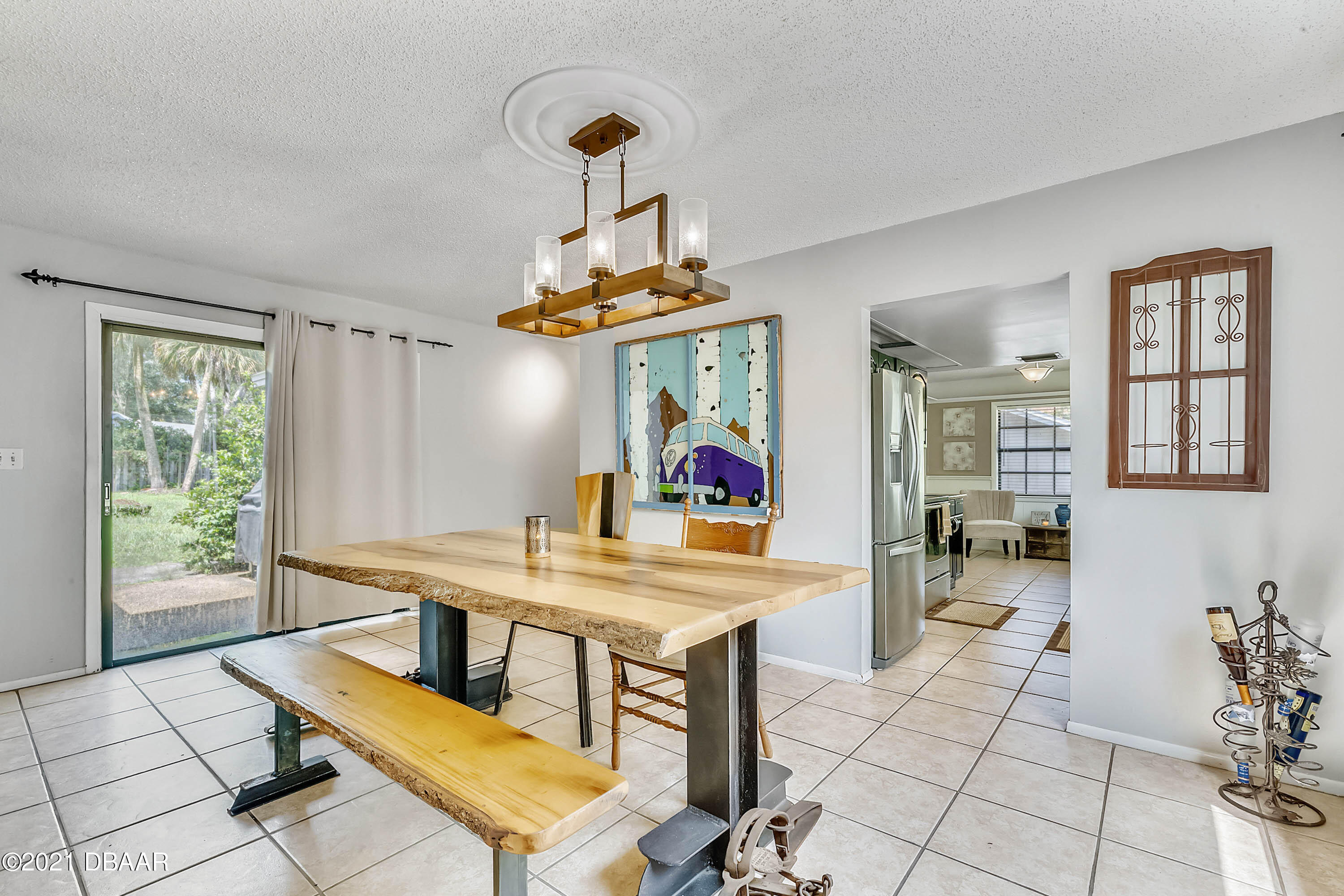 2815 Concord Road DeLand, FL 32720 - Photo 16 of 29 a view of a dining room with furniture window and outside view