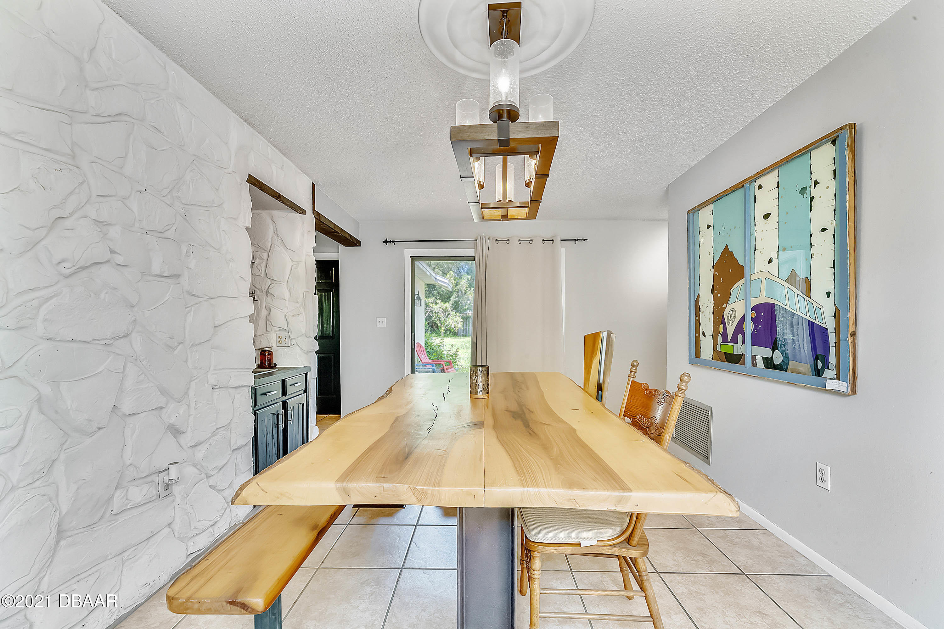 2815 Concord Road DeLand, FL 32720 - Photo 17 of 29 a view of a dining room with a table and chairs