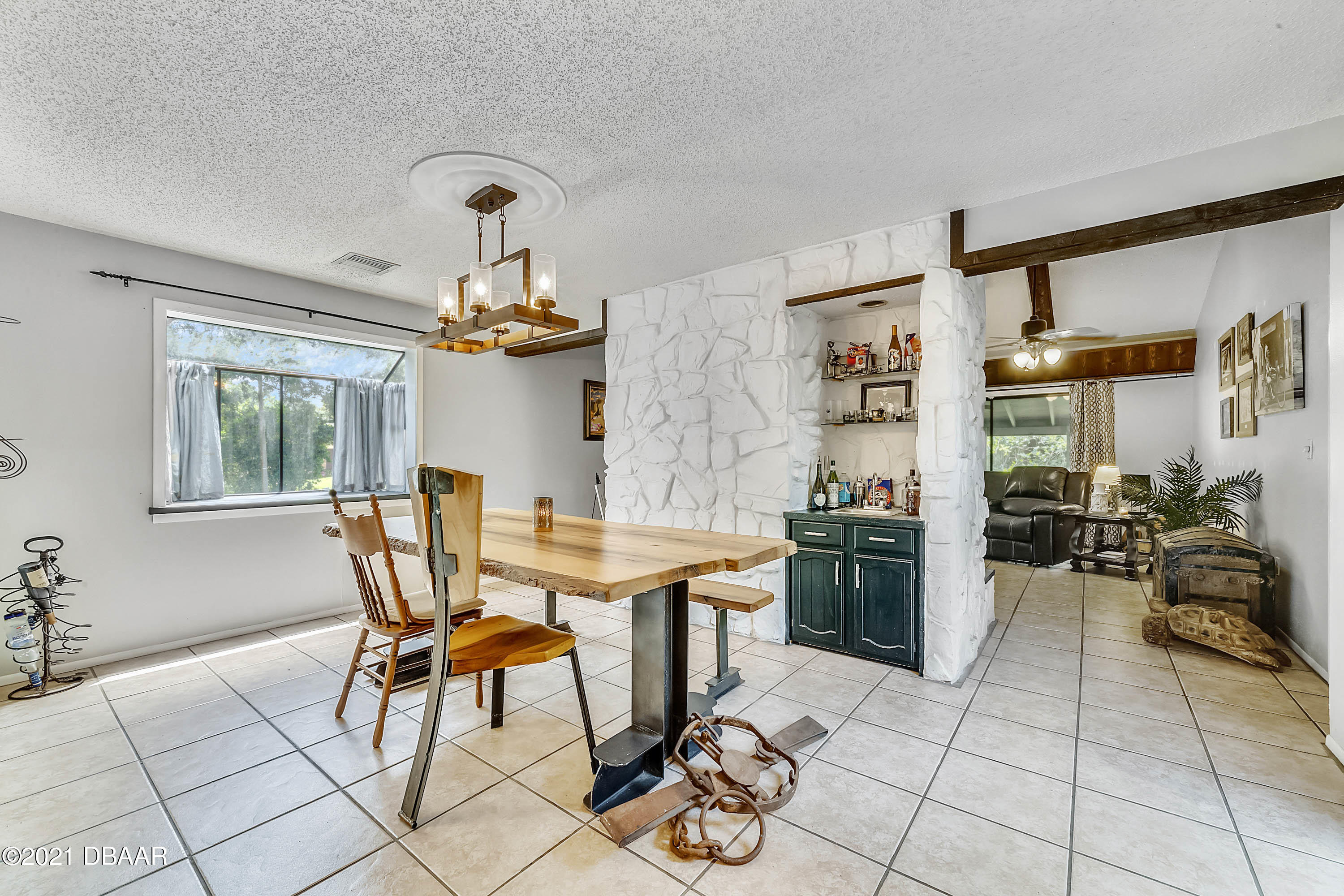 2815 Concord Road DeLand, FL 32720 - Photo 18 of 29 a dining room with furniture and window