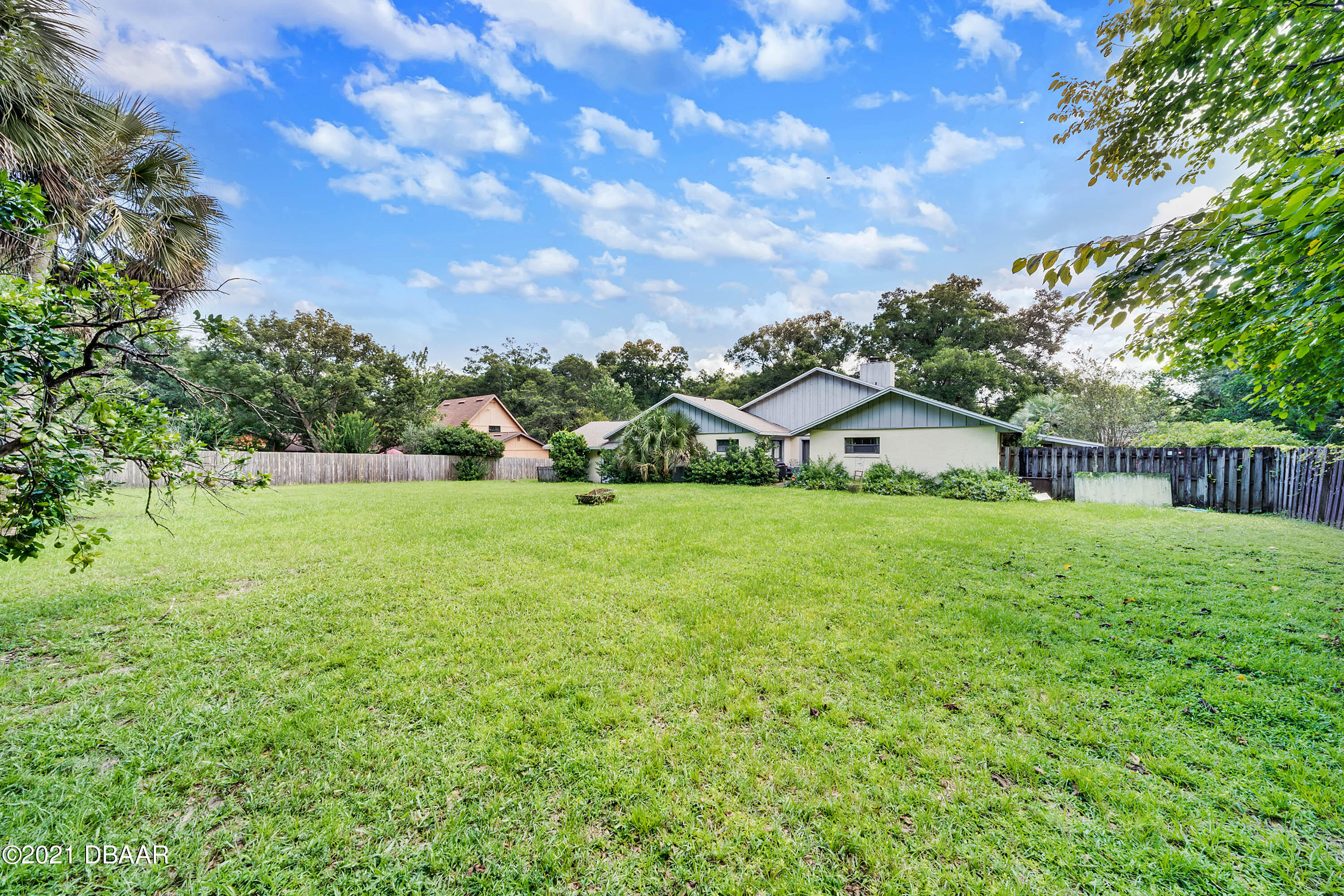 2815 Concord Road DeLand, FL 32720 - Photo 27 of 29 a view of a house with a yard