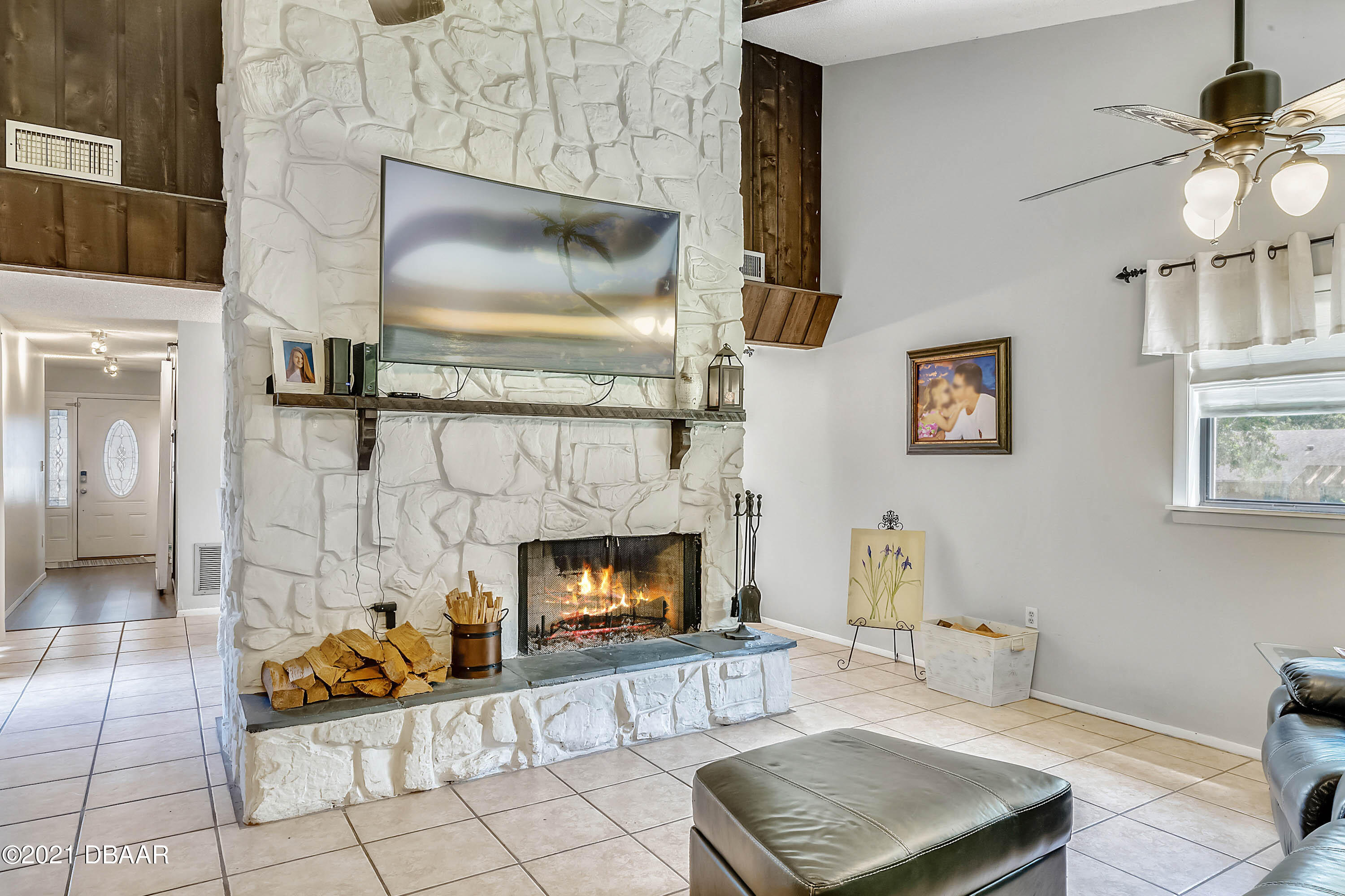 2815 Concord Road DeLand, FL 32720 - Photo 7 of 29 a living room with furniture and a fireplace