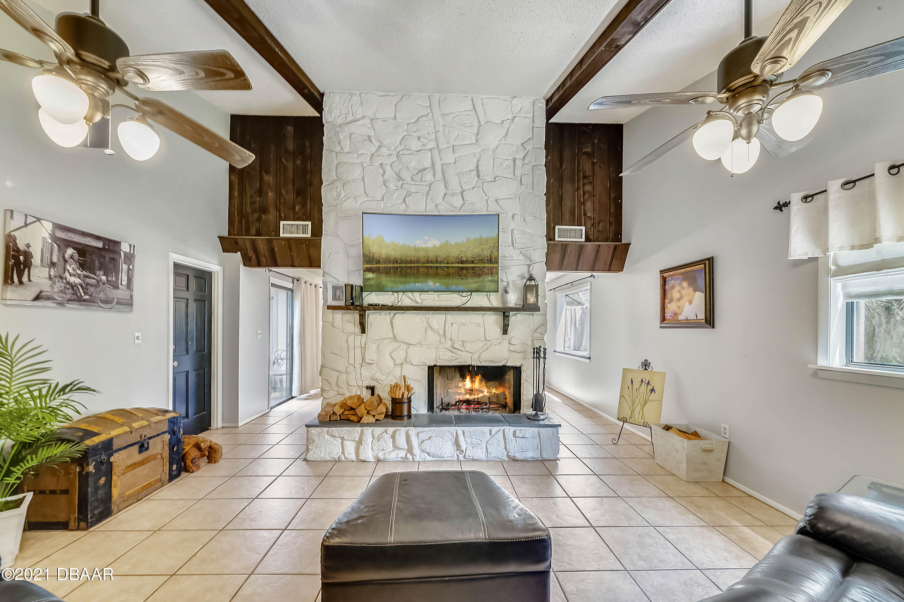 2815 Concord Road DeLand, FL 32720 - Photo 8 of 29 a living room with furniture and a fireplace