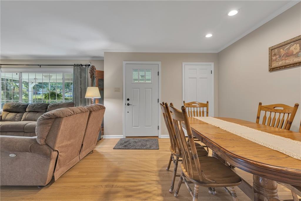 2850 Dutch Ridge Road Beaver, PA 15009 - Photo 11 of 31 a living room with furniture wooden floor and a floor to ceiling window