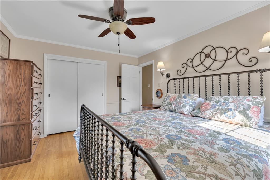 2850 Dutch Ridge Road Beaver, PA 15009 - Photo 12 of 31 a bedroom with a bed and a chandelier