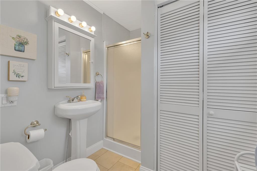 2850 Dutch Ridge Road Beaver, PA 15009 - Photo 19 of 31 a bathroom with a sink and mirror