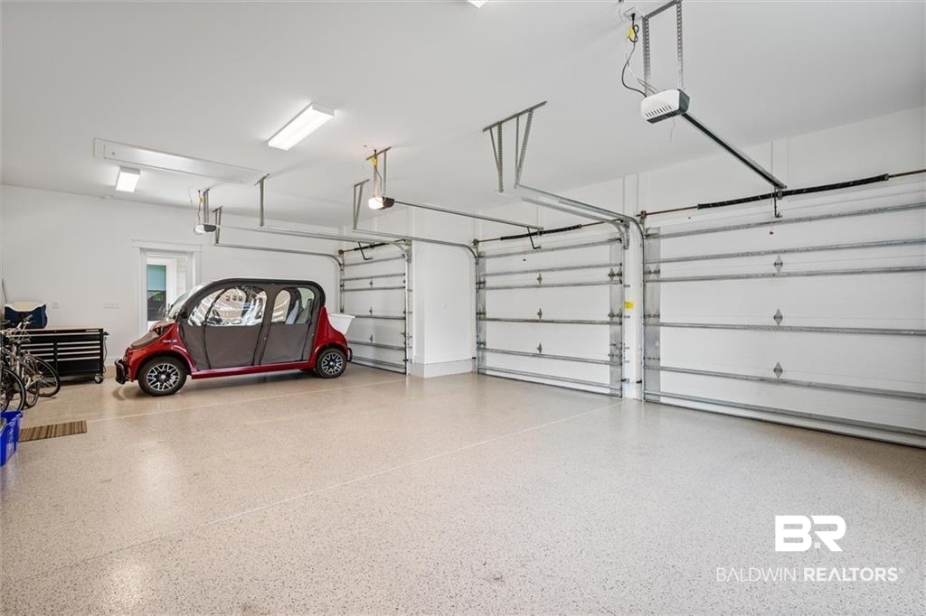 707 Cardamel Court Fairhope, AL 36532 - Photo 38 of 40 Garage with a garage door opener
