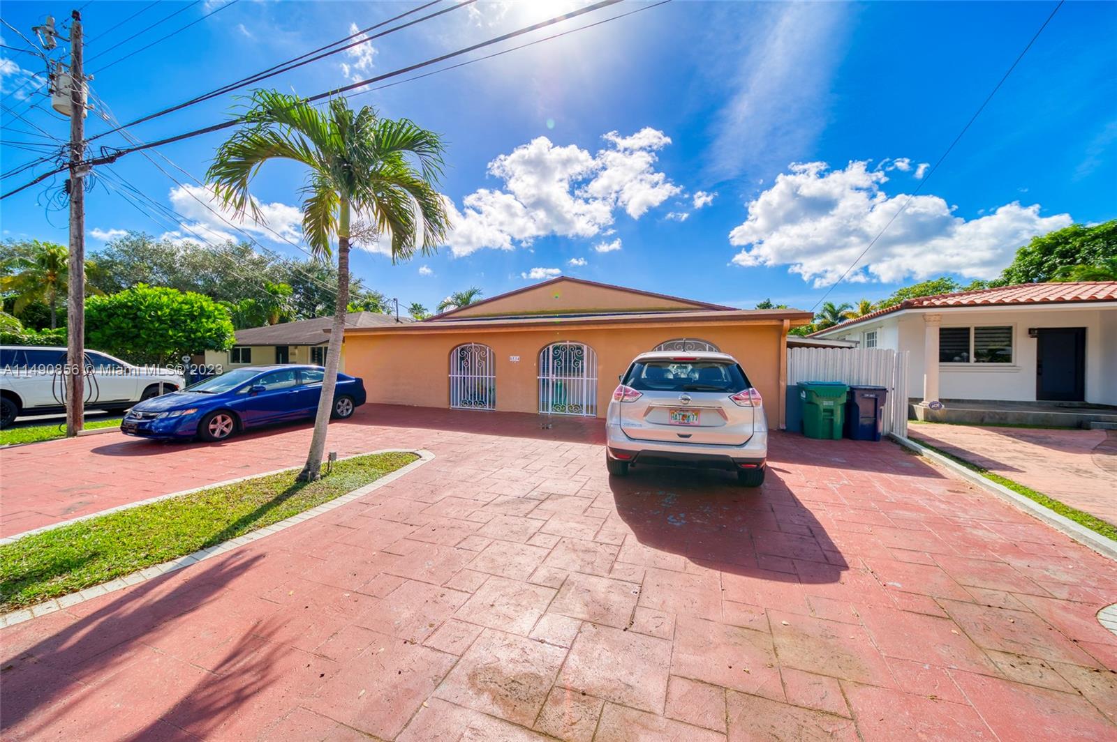 6534 Southwest 34th Street, Unit 2 Miami, FL 33155 - Photo 1 of 20 a front view of house with yard and entertaining space