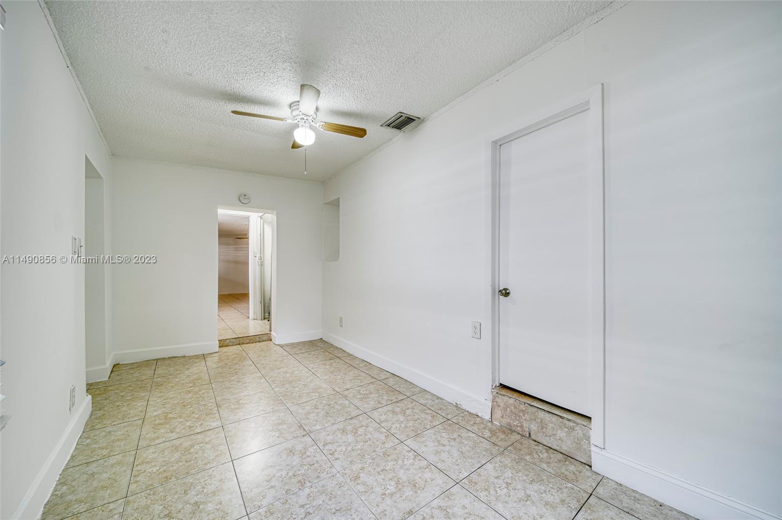 6534 Southwest 34th Street, Unit 2 Miami, FL 33155 - Photo 14 of 20 an empty space with closet