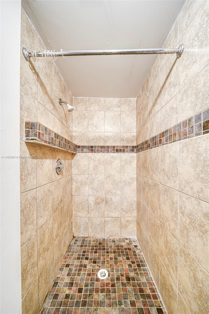 6534 Southwest 34th Street, Unit 2 Miami, FL 33155 - Photo 15 of 20 a bathroom with a shower